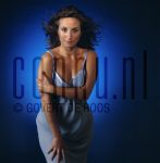 06-07-2001 Sabine de Koning at studio in Amsterdam, July 06, 2001.

[keywords]Posed, Half Length, Eyecontact, Blue Dress[/keywords]